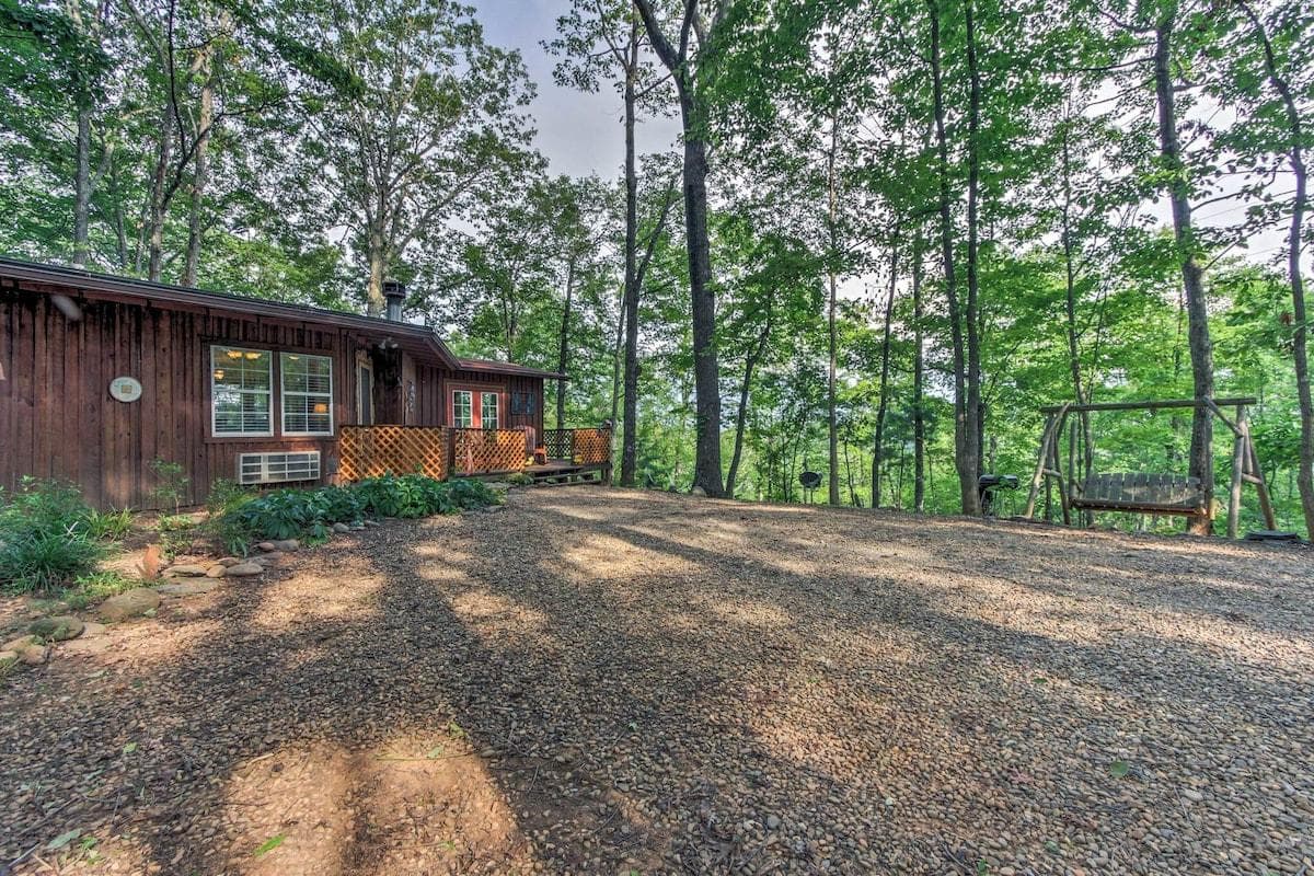 Plenty of parking at the front door with rocking chairs on the porch and a swing in the yard. 